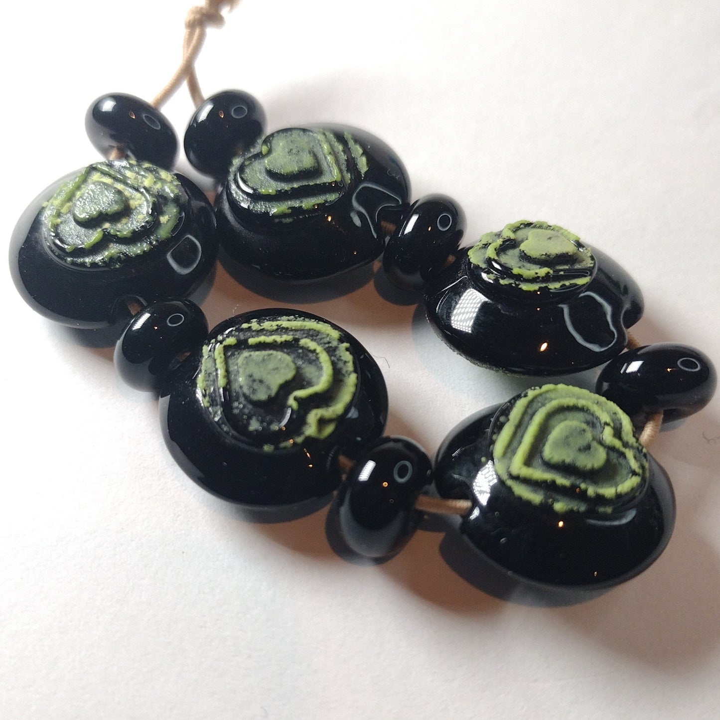 Black lentils with lime textured hearts lampwork bead set Jolene Beads