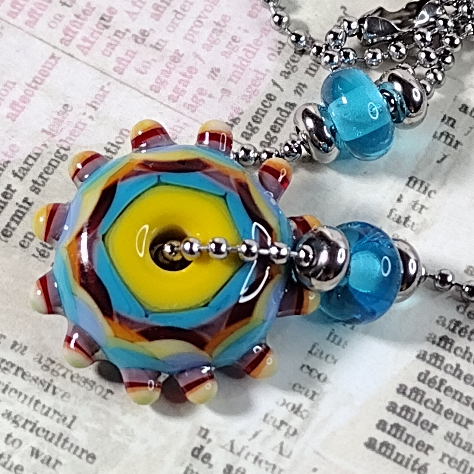 Sunshine lampwork rainbow disc necklace Jolene Beads