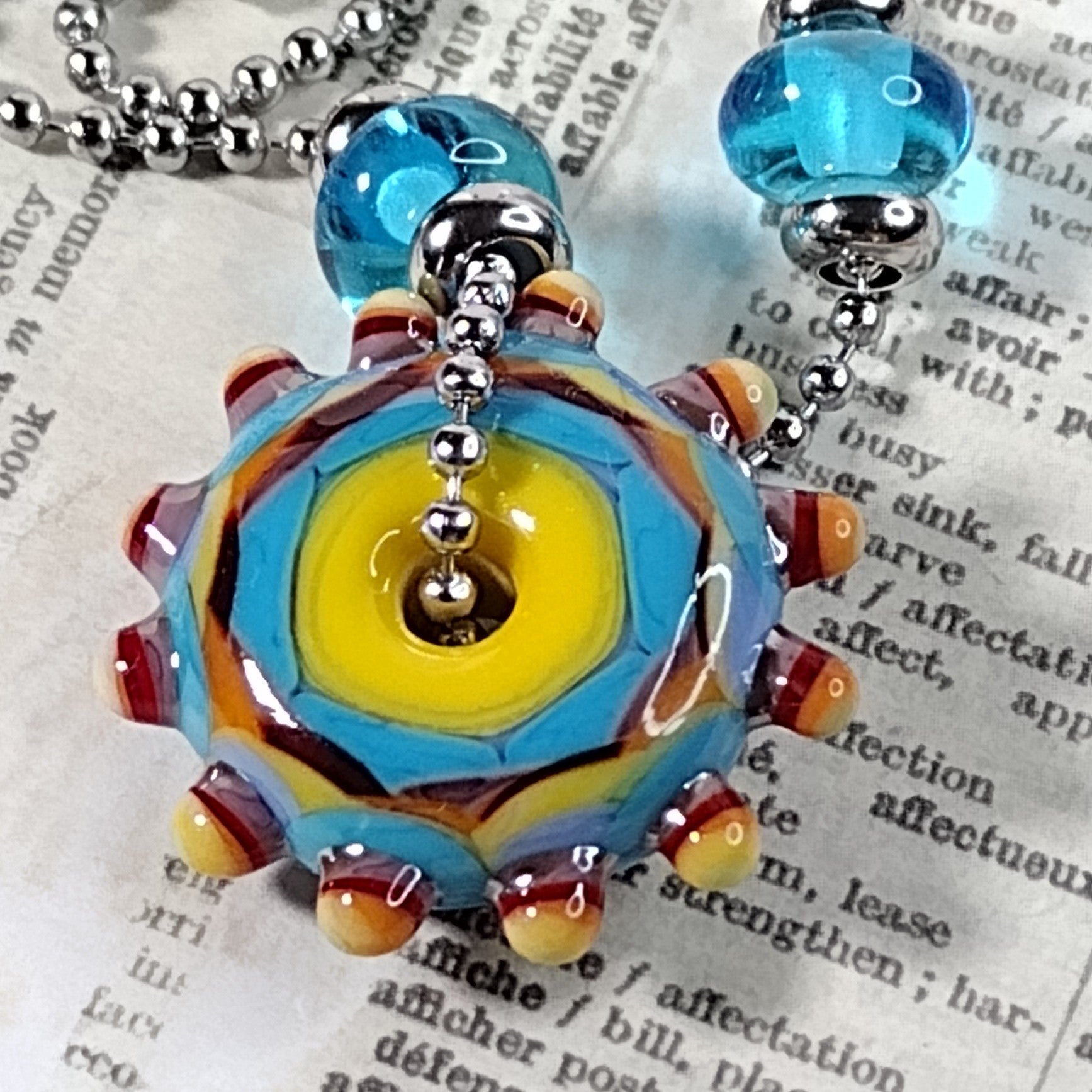 Sunshine lampwork rainbow disc necklace Jolene Beads