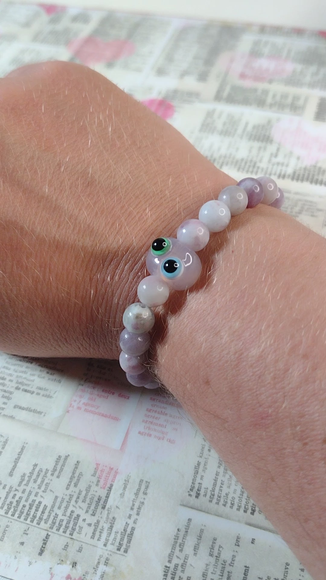video of a lepidolite buddy bead bracelet being worn to show scale